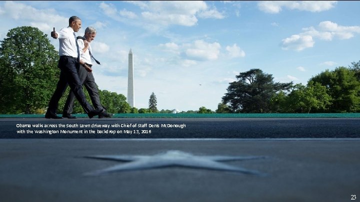 Obama walks across the South Lawn driveway with Chief of Staff Denis Mc. Donough