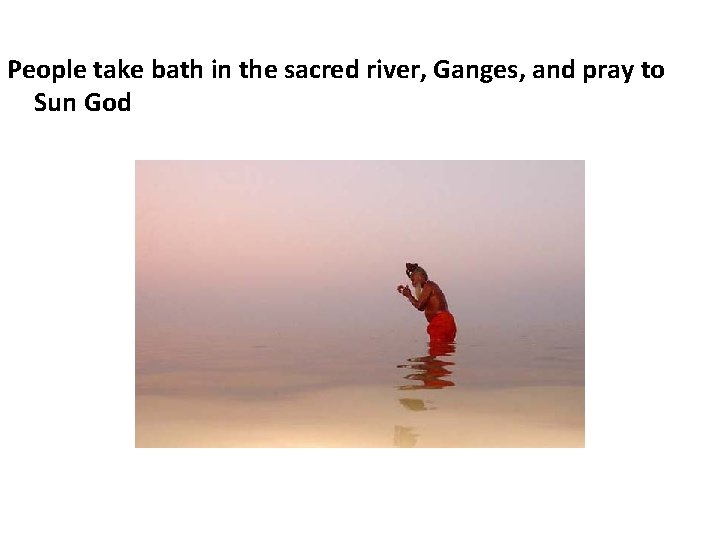 People take bath in the sacred river, Ganges, and pray to Sun God 