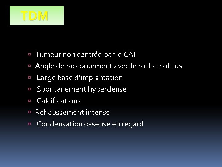 TDM Tumeur non centrée par le CAI Angle de raccordement avec le rocher: obtus.