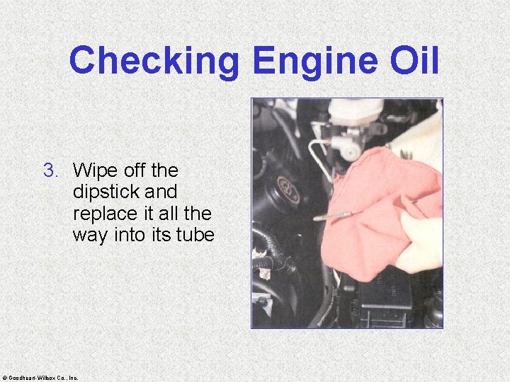 Checking Engine Oil 3. Wipe off the dipstick and replace it all the way
