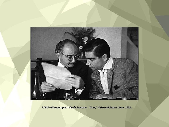 PARIS—Photographers David Seymour, "Chim, " (left) and Robert Capa, 1952. 
