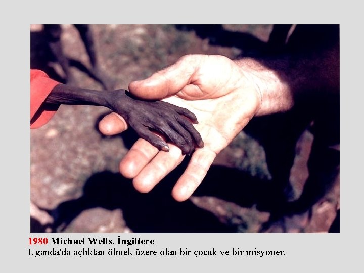 1980 Michael Wells, İngiltere Uganda'da açlıktan ölmek üzere olan bir çocuk ve bir misyoner.