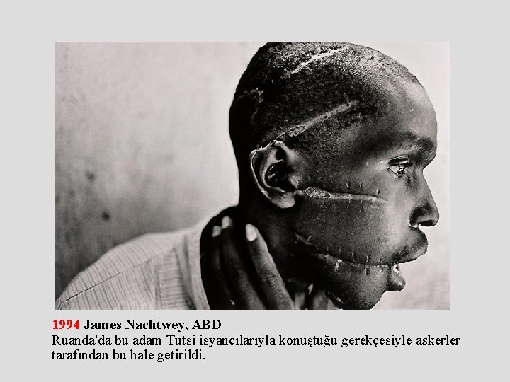 1994 James Nachtwey, ABD Ruanda'da bu adam Tutsi isyancılarıyla konuştuğu gerekçesiyle askerler tarafından bu