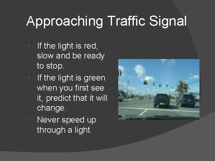 Approaching Traffic Signal If the light is red, slow and be ready to stop.