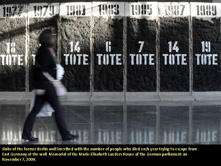 Slabs of the former Berlin wall inscribed with the number of people who died