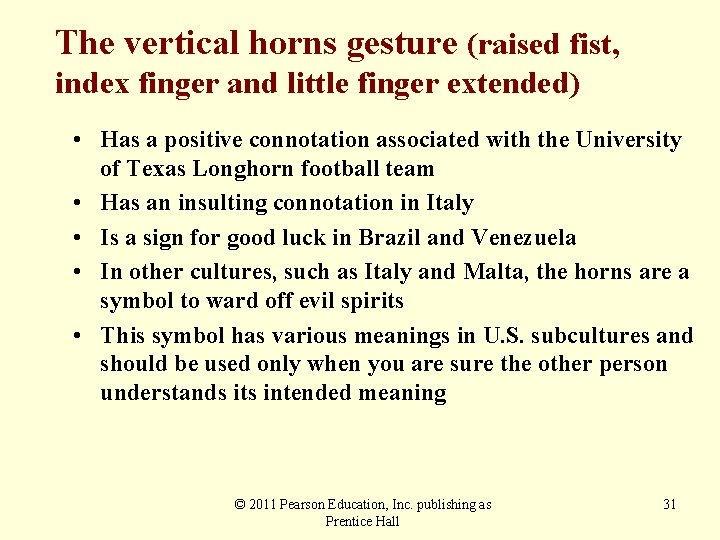 The vertical horns gesture (raised fist, index finger and little finger extended) • Has