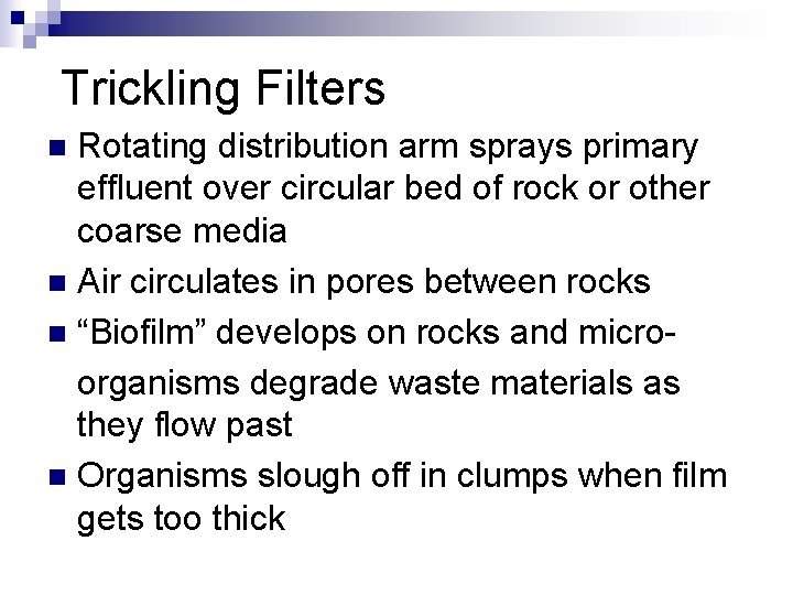 Trickling Filters Rotating distribution arm sprays primary effluent over circular bed of rock or