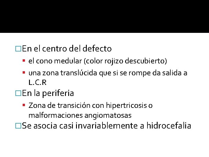 �En el centro del defecto el cono medular (color rojizo descubierto) una zona translúcida