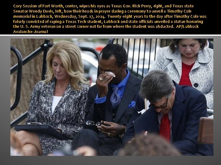 Cory Session of Fort Worth, center, wipes his eyes as Texas Gov. Rick Perry,