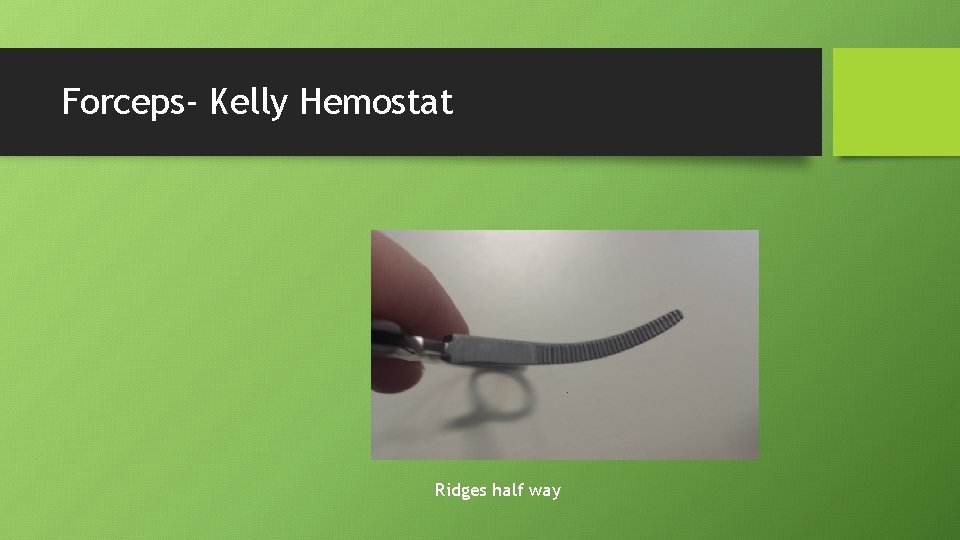 Forceps- Kelly Hemostat Ridges half way 