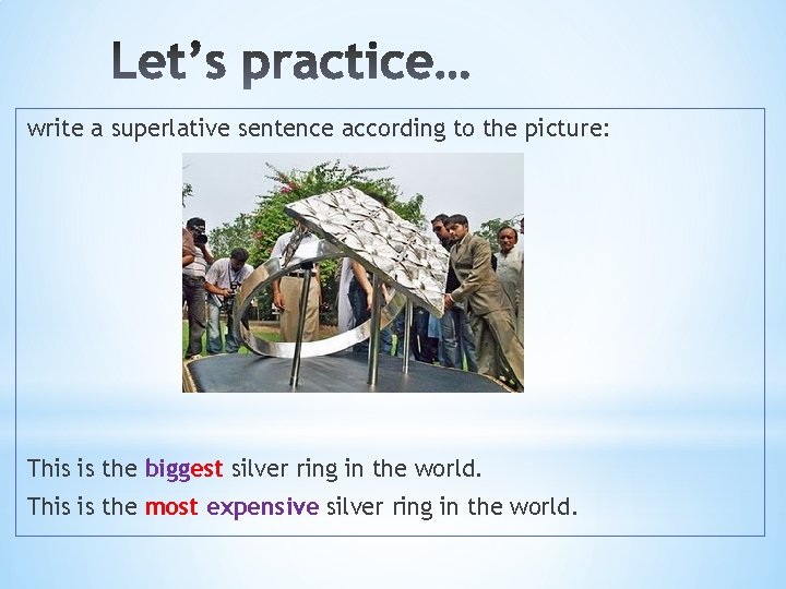 write a superlative sentence according to the picture: This is the biggest silver ring