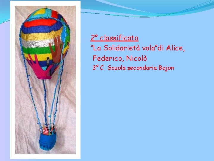 2° classificato “La Solidarietà vola”di Alice, Federico, Nicolò 3° C Scuola secondaria Bojon 