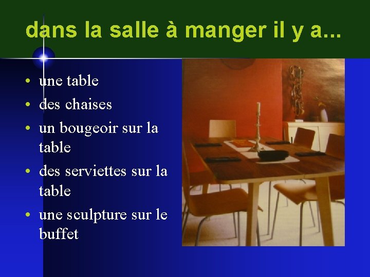 dans la salle à manger il y a. . . • une table •