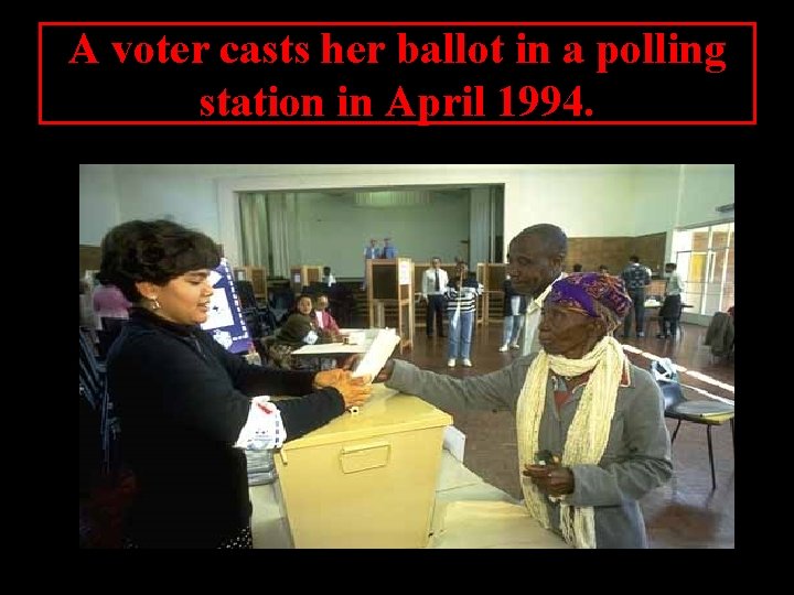 A voter casts her ballot in a polling station in April 1994. 