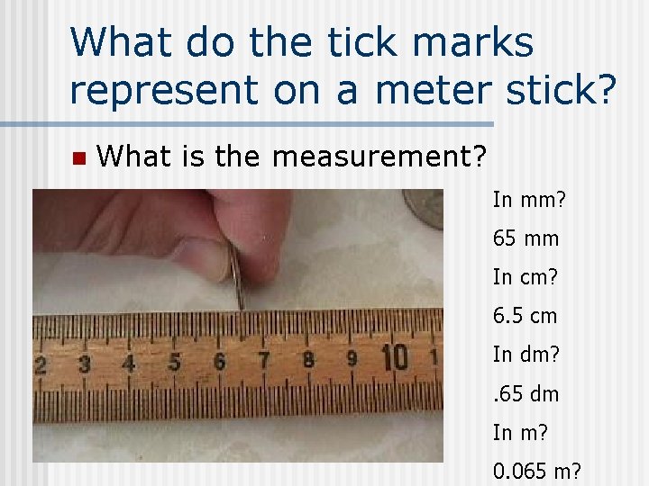 What do the tick marks represent on a meter stick? n What is the