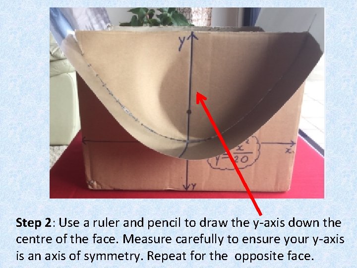 Step 2: Use a ruler and pencil to draw the y-axis down the centre