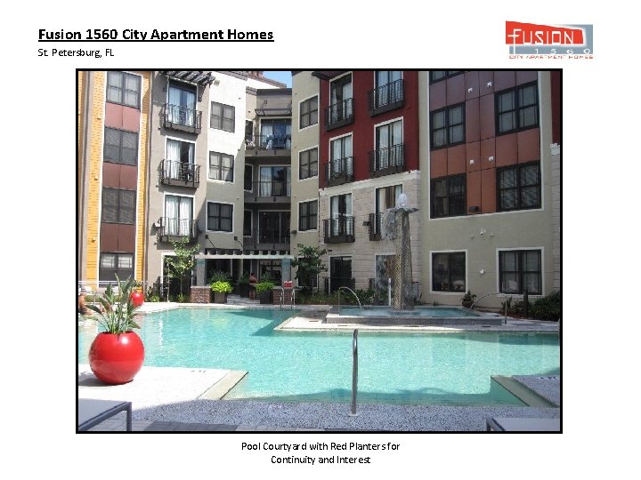 Fusion 1560 City Apartment Homes St. Petersburg, FL Pool Courtyard with Red Planters for