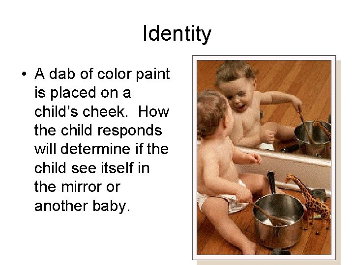 Identity • A dab of color paint is placed on a child’s cheek. How