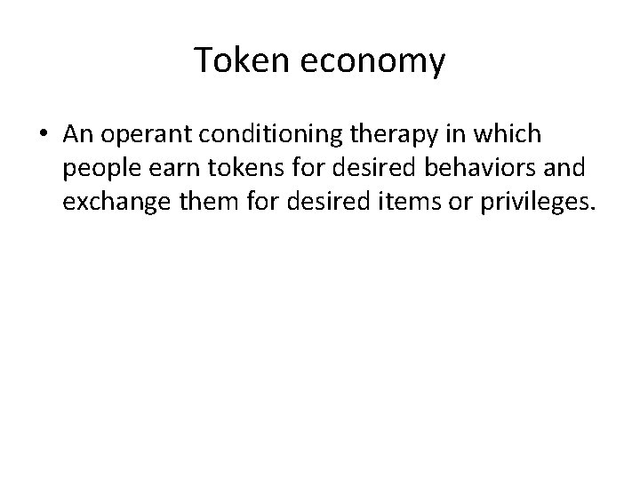 Token economy • An operant conditioning therapy in which people earn tokens for desired