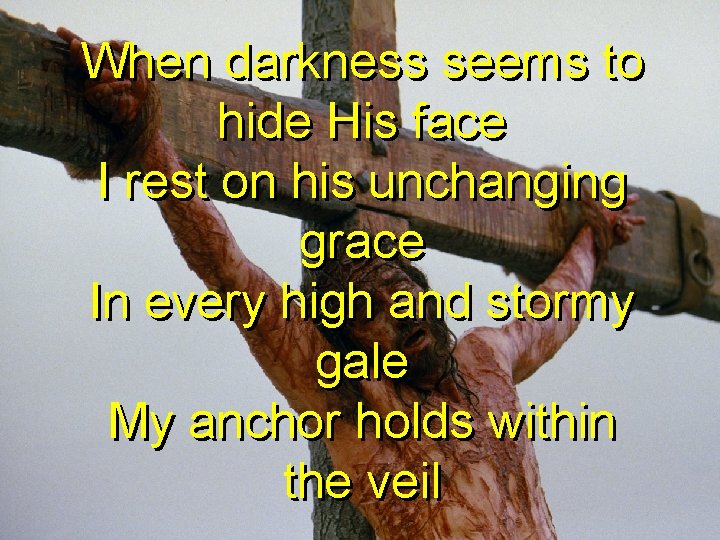 When darkness seems to hide His face I rest on his unchanging grace In