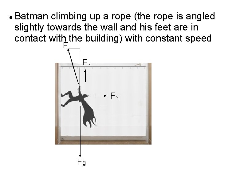  Batman climbing up a rope (the rope is angled slightly towards the wall