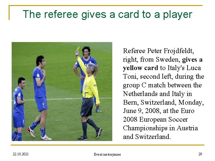 The referee gives a card to a player Referee Peter Frojdfeldt, right, from Sweden,