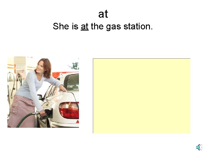 at She is at the gas station. 