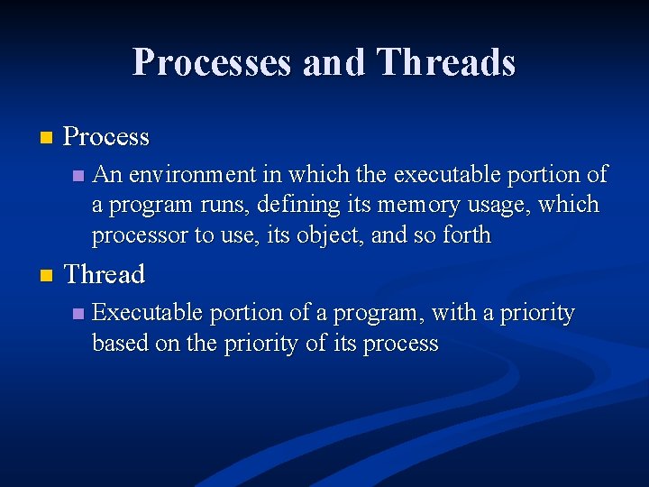 Processes and Threads n Process n n An environment in which the executable portion