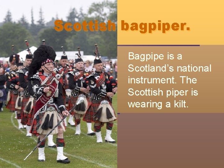 Scottish bagpiper. Bagpipe is a Scotland’s national instrument. The Scottish piper is wearing a