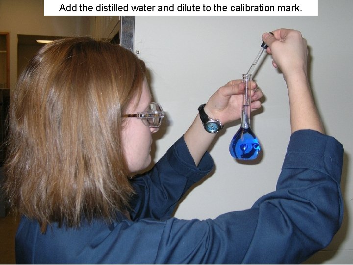 Add the distilled water and dilute to the calibration mark. 