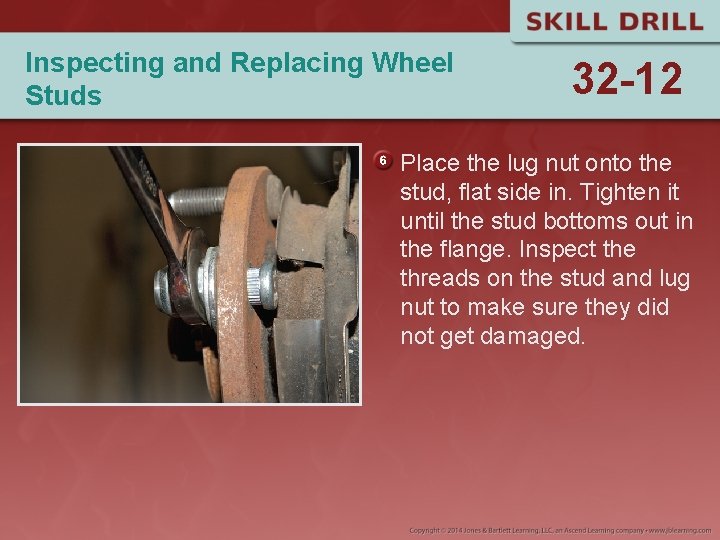 Inspecting and Replacing Wheel Studs 32 -12 Place the lug nut onto the stud,