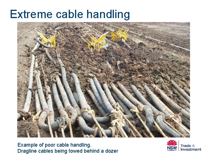 Extreme cable handling Example of poor cable handling. Dragline cables being towed behind a