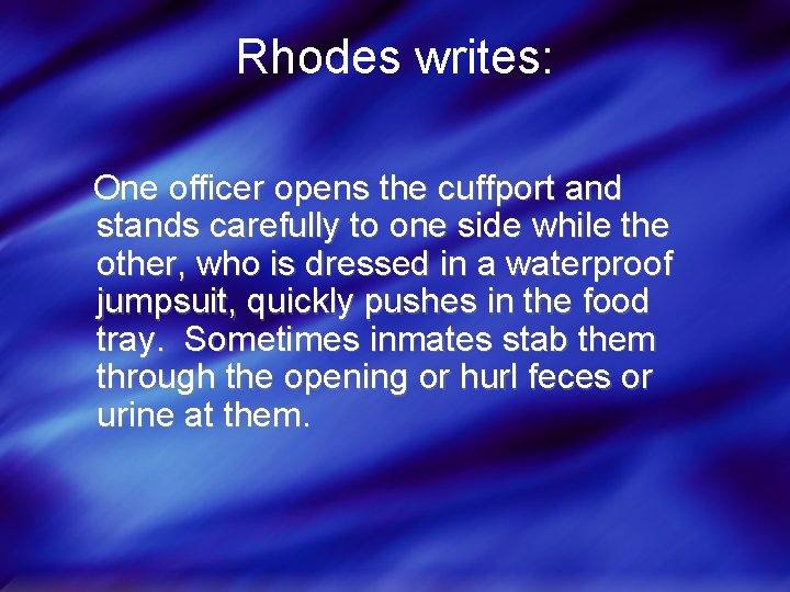 Rhodes writes: One officer opens the cuffport and stands carefully to one side while