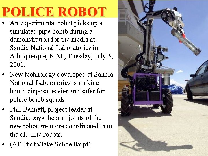 POLICE ROBOT • An experimental robot picks up a simulated pipe bomb during a POLICE ROBOT • An experimental robot picks up a simulated pipe bomb during a