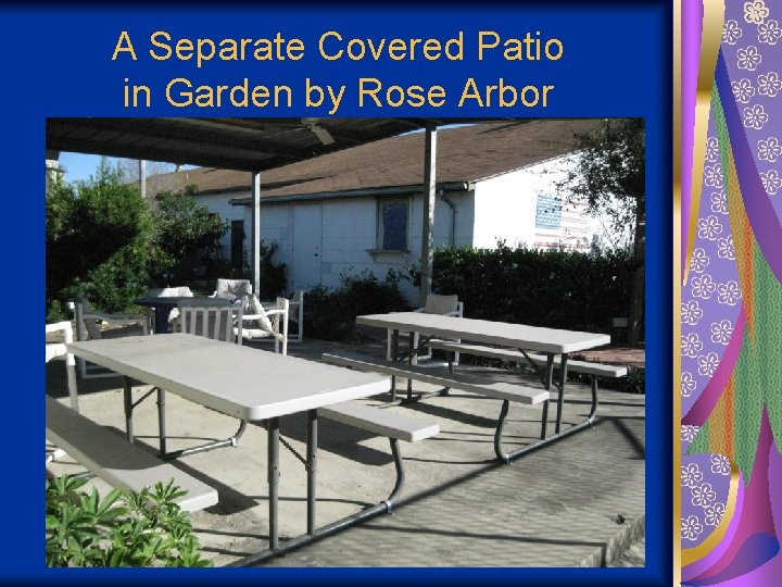 A Separate Covered Patio in Garden by Rose Arbor 