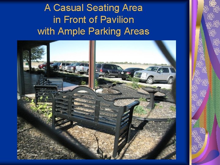 A Casual Seating Area in Front of Pavilion with Ample Parking Areas 