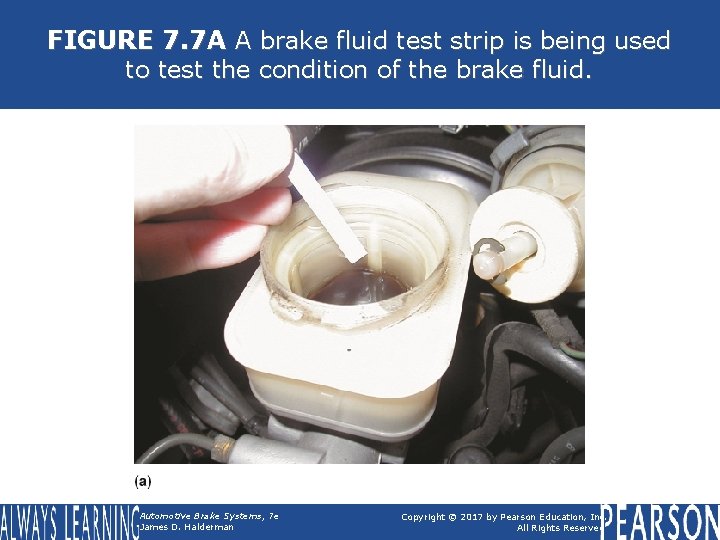 FIGURE 7. 7 A A brake fluid test strip is being used to test