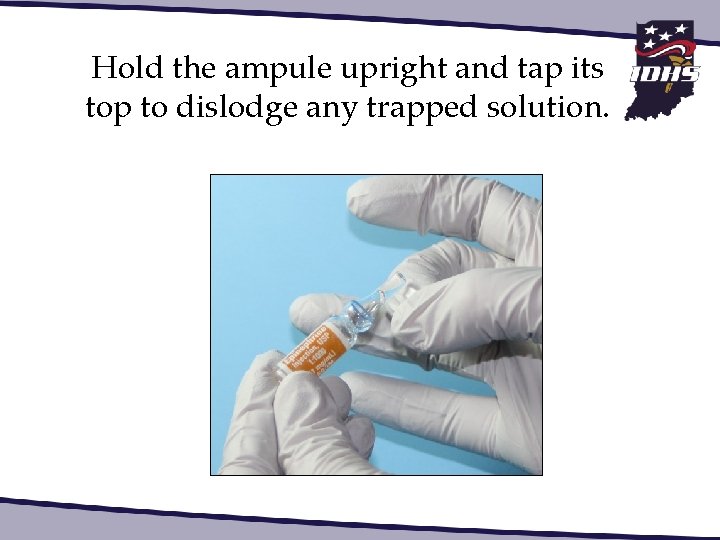 Hold the ampule upright and tap its top to dislodge any trapped solution. 