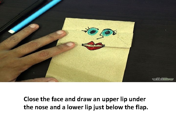Close the face and draw an upper lip under the nose and a lower