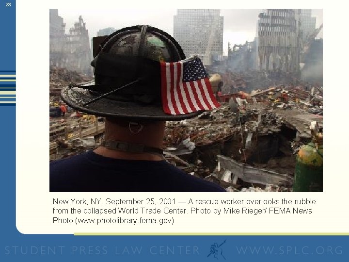 23 New York, NY, September 25, 2001 — A rescue worker overlooks the rubble