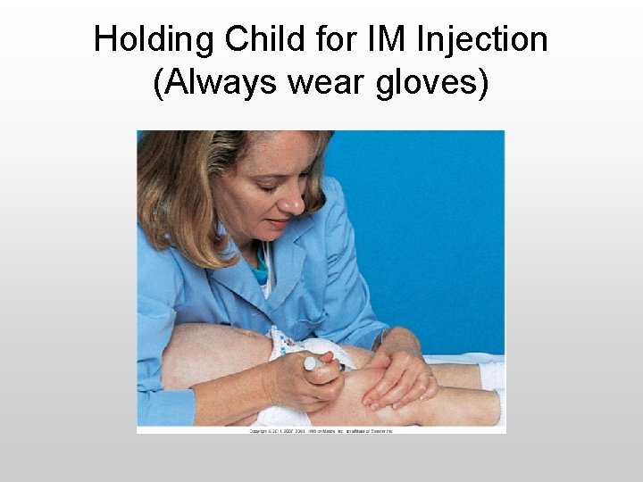 Holding Child for IM Injection (Always wear gloves) 