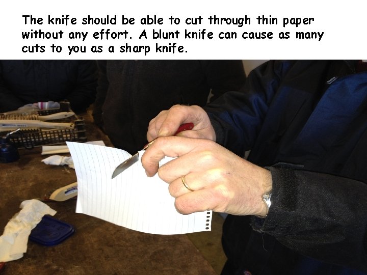 The knife should be able to cut through thin paper without any effort. A