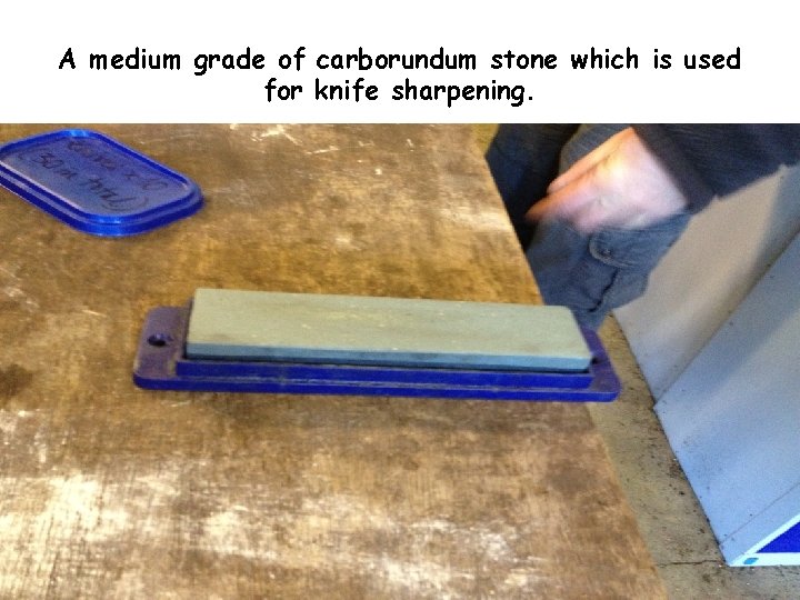 A medium grade of carborundum stone which is used for knife sharpening. 