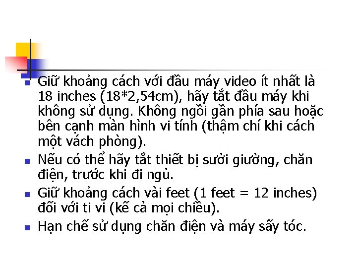 n n Giữ khoảng cách với đầu máy video ít nhất là 18 inches