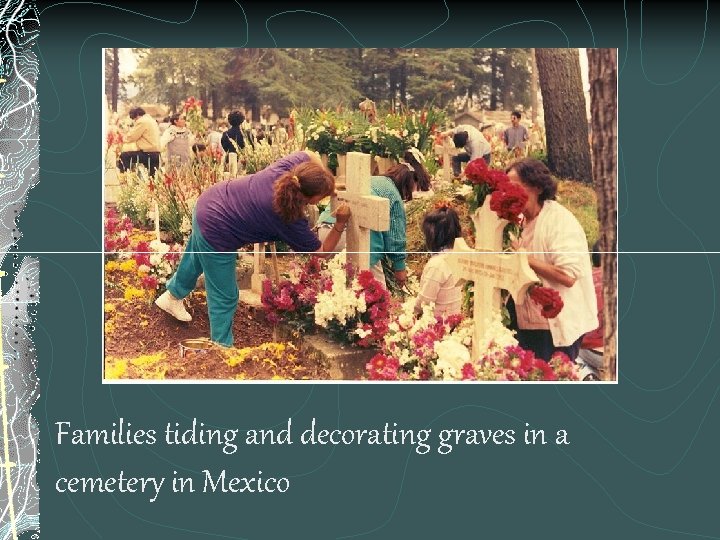 Families tiding and decorating graves in a cemetery in Mexico 