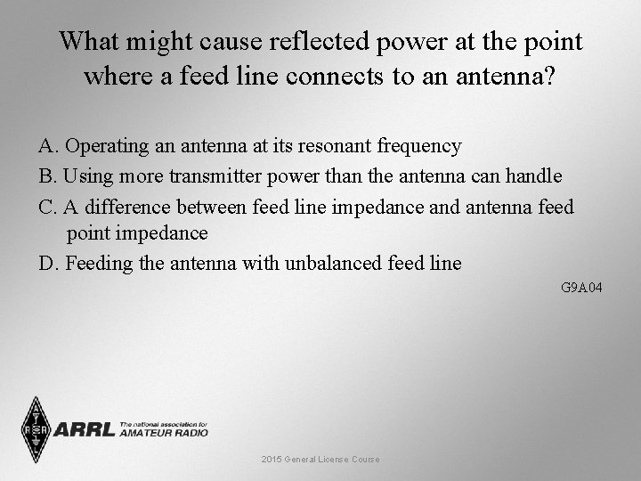 What might cause reflected power at the point where a feed line connects to