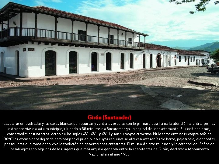 Girón (Santander) Las calles empedradas y las casas blancas con puertas y ventanas oscuras Girón (Santander) Las calles empedradas y las casas blancas con puertas y ventanas oscuras