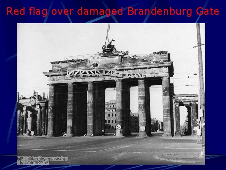 Red flag over damaged Brandenburg Gate 