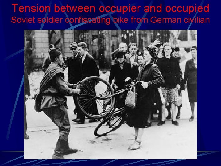 Tension between occupier and occupied Soviet soldier confiscating bike from German civilian 