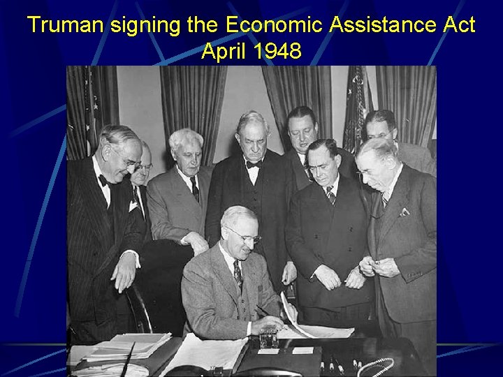 Truman signing the Economic Assistance Act April 1948 